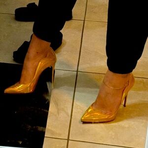 Gold hologram Christian Louboutin only worn once!